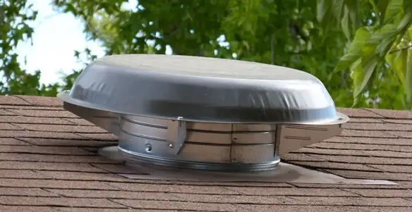 attic fan installation services with low-profile roof ventilation unit in Modesto, CA
