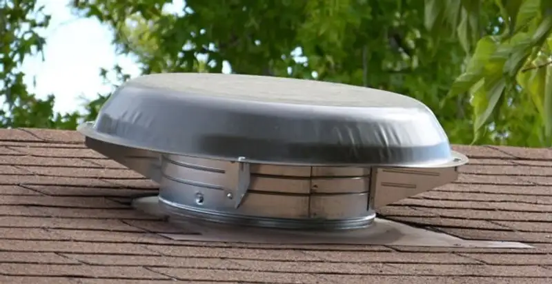 attic fan installation services with low-profile roof ventilation unit in Modesto, CA