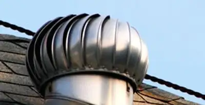 attic fan installation services with professionally installed roof ventilation unit in Modesto, CA
