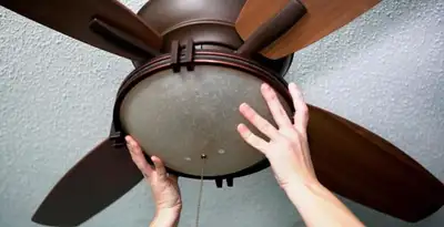 Ceiling fan repair and reinstallation on ceiling mount in Modesto, CA