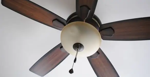 Fully installed ceiling fan with balanced blades and light fixture in Modesto, CA