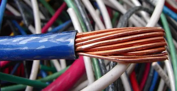 electrical wiring services showing exposed copper conductors and cable preparation in Modesto, CA