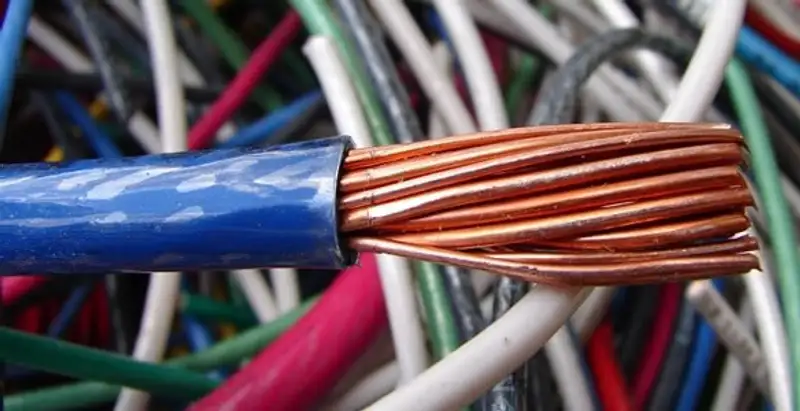 electrical wiring services showing exposed copper conductors and cable preparation in Modesto, CA