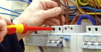 electrician services performing professional electrical panel wiring and connections in Modesto, CA