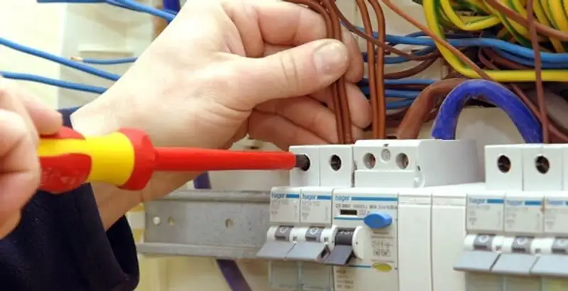 electrician services performing professional electrical panel wiring and connections in Modesto, CA