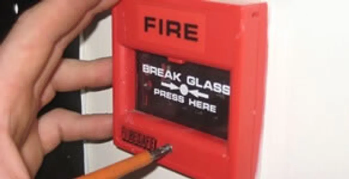 fire alarm installation service showing manual fire alarm pull station installed by licensed electricians in Modesto, CA