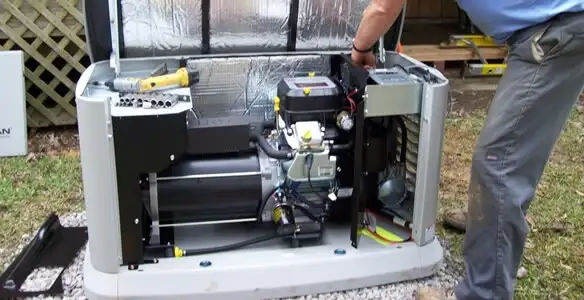 generator installation service showing technician connecting and configuring generator components in Modesto, CA