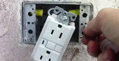 gfci circuits service showing installation of a ground fault circuit interrupter outlet by licensed electricians in Modesto, CA