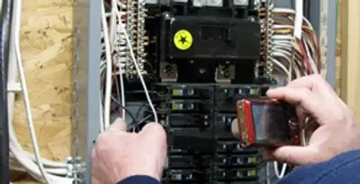 Home electrical inspection of circuit breaker panel by licensed electrician in Modesto, CA