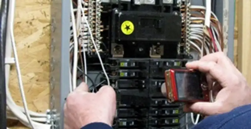 Home electrical inspection of circuit breaker panel by licensed electrician in Modesto, CA