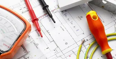 licensed electrician planning and testing electrical systems using professional tools in Modesto, CA