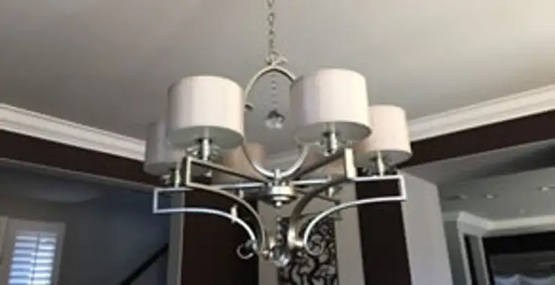 Modern chandelier installation with multiple light fixtures in Modesto, CA