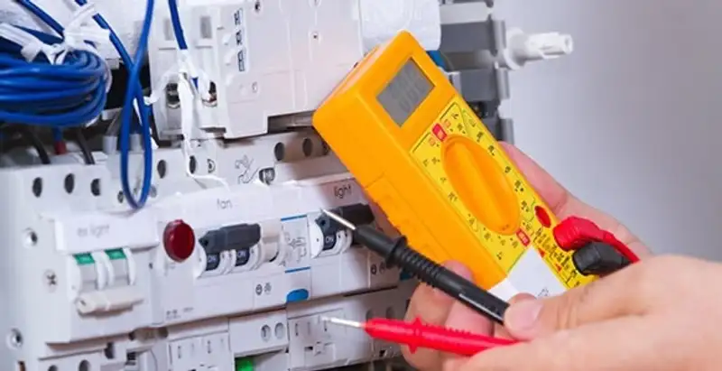 Residential electrician testing home electrical panel for safety and performance in Modesto, CA