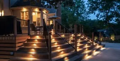 Residential electrician installing outdoor lighting for home safety in Modesto, CA