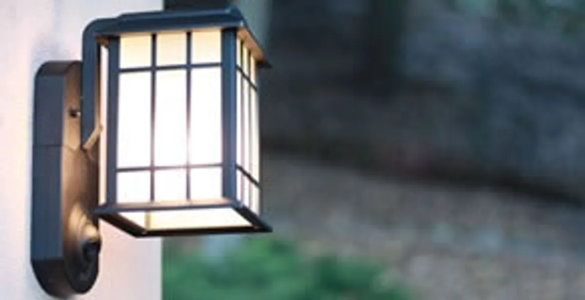 security light installation services with professionally mounted exterior wall light in Modesto, CA