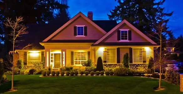 security light installation services illuminating a residential exterior at night in Modesto, CA