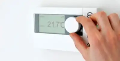 Thermostat installation service with professional adjusting temperature control in Modesto, CA