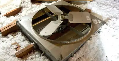 whole house fan installation services with attic-mounted ventilation unit in Modesto, CA